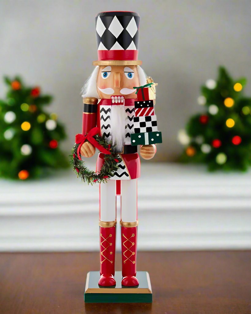 Christmas Cheer All Year 15" black and white harlequin nutcracker soldier with wreath and presents