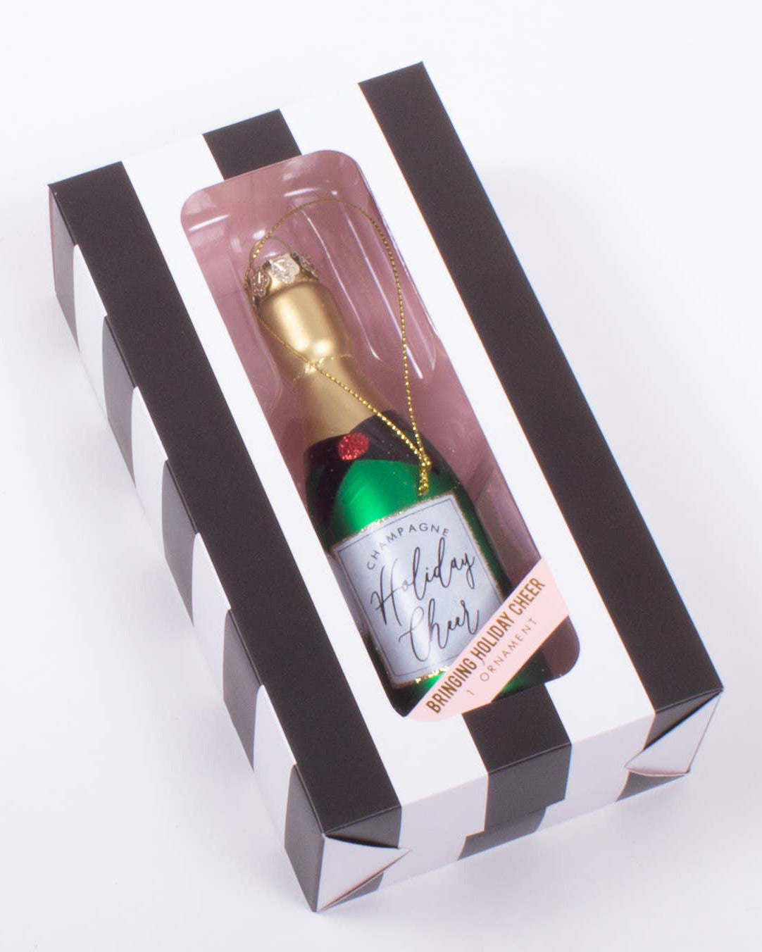 Christmas Cheer All Year Bottle of champagne ornament in a decorative box on a white background
