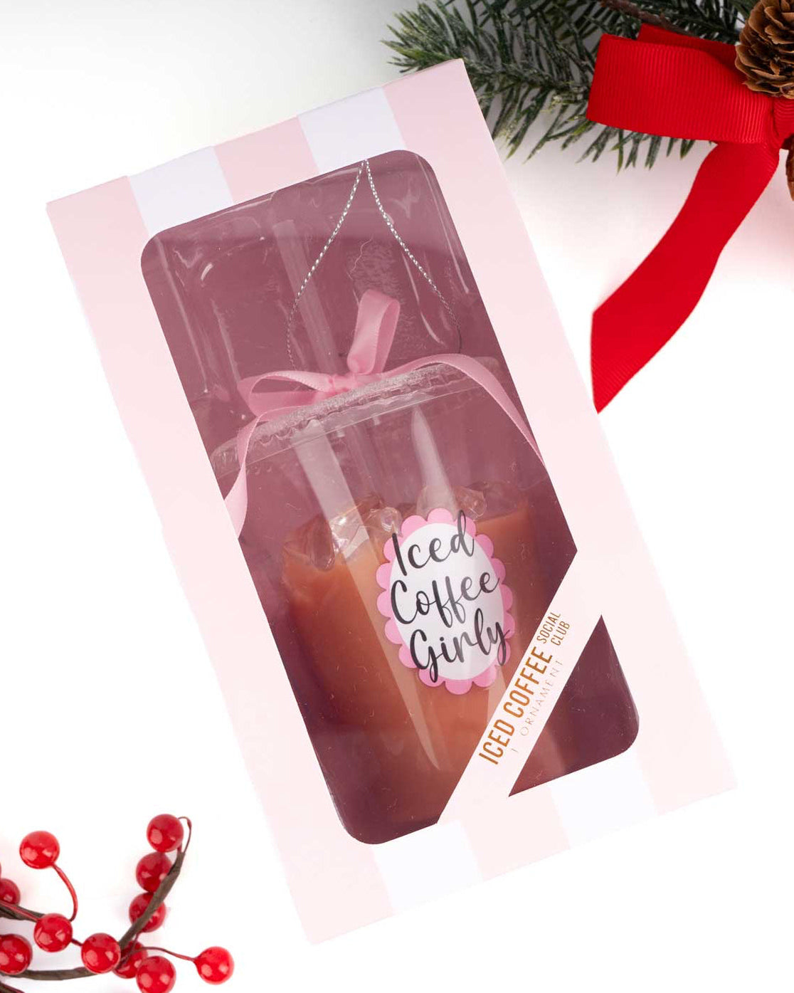 Christmas Cheer All Year Packaged Iced Latte Ornament with 'Iced Coffee Girly' text, surrounded by Christmas decorations on a white background