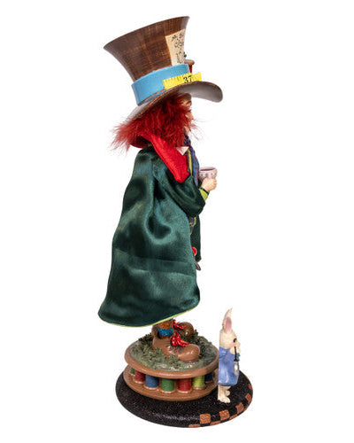 Mad Hatter figurine from 'Alice in Wonderland' on a white background