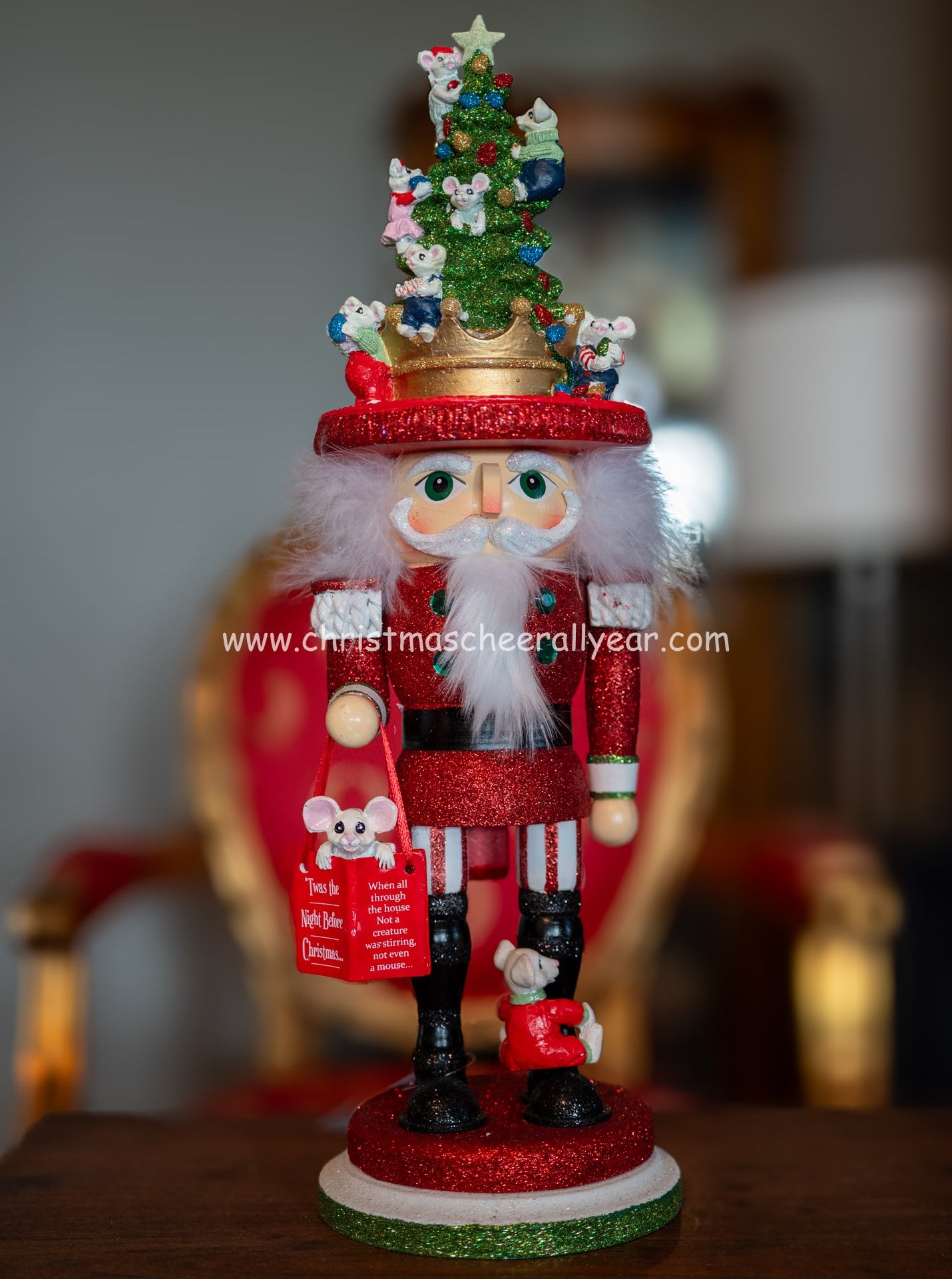 Christmas Cheer All Year Decorative nutcracker figure with a Christmas tree and mice with Twas the Night Before Christmas book