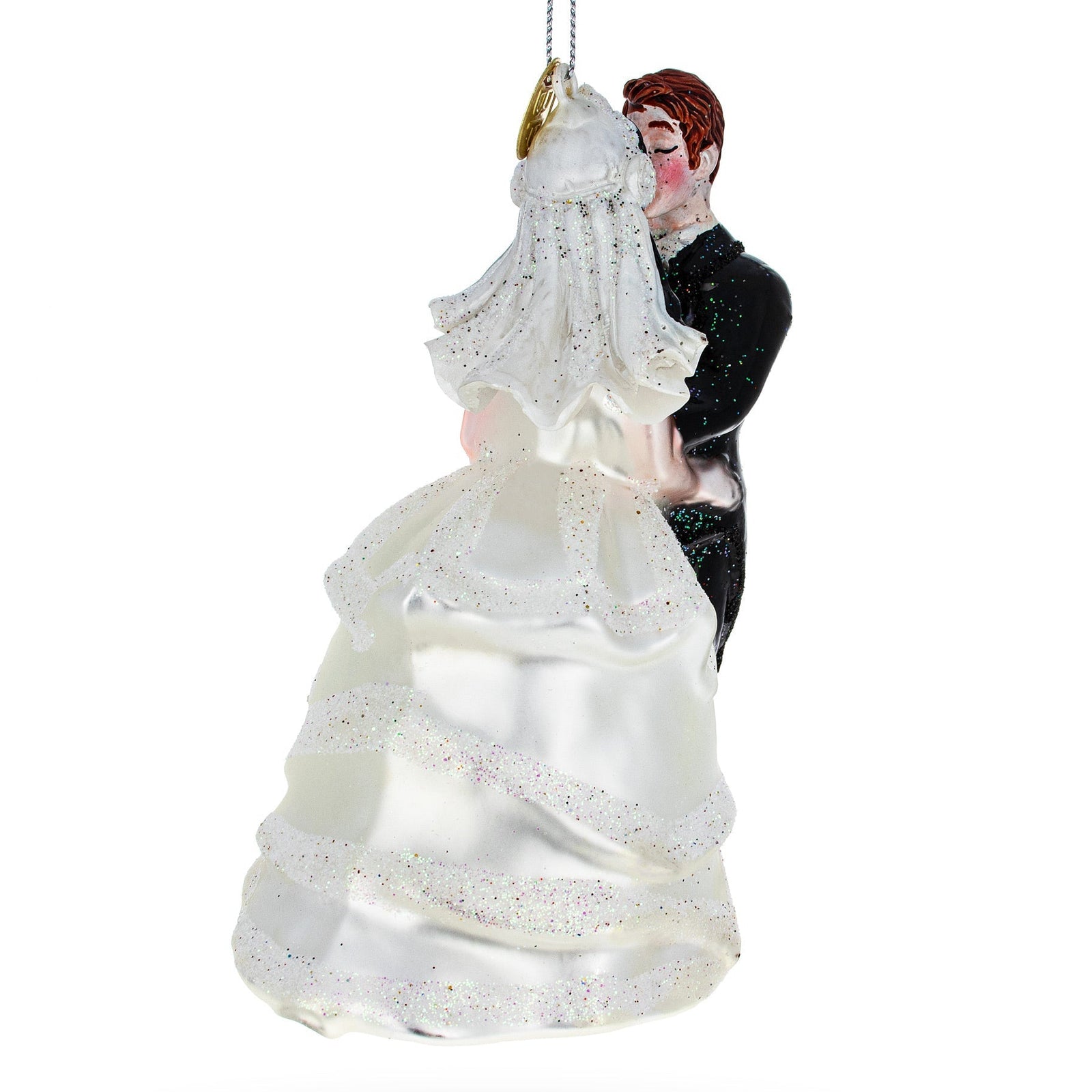 Decorative ornament of a bride and groom in wedding attire on a white background