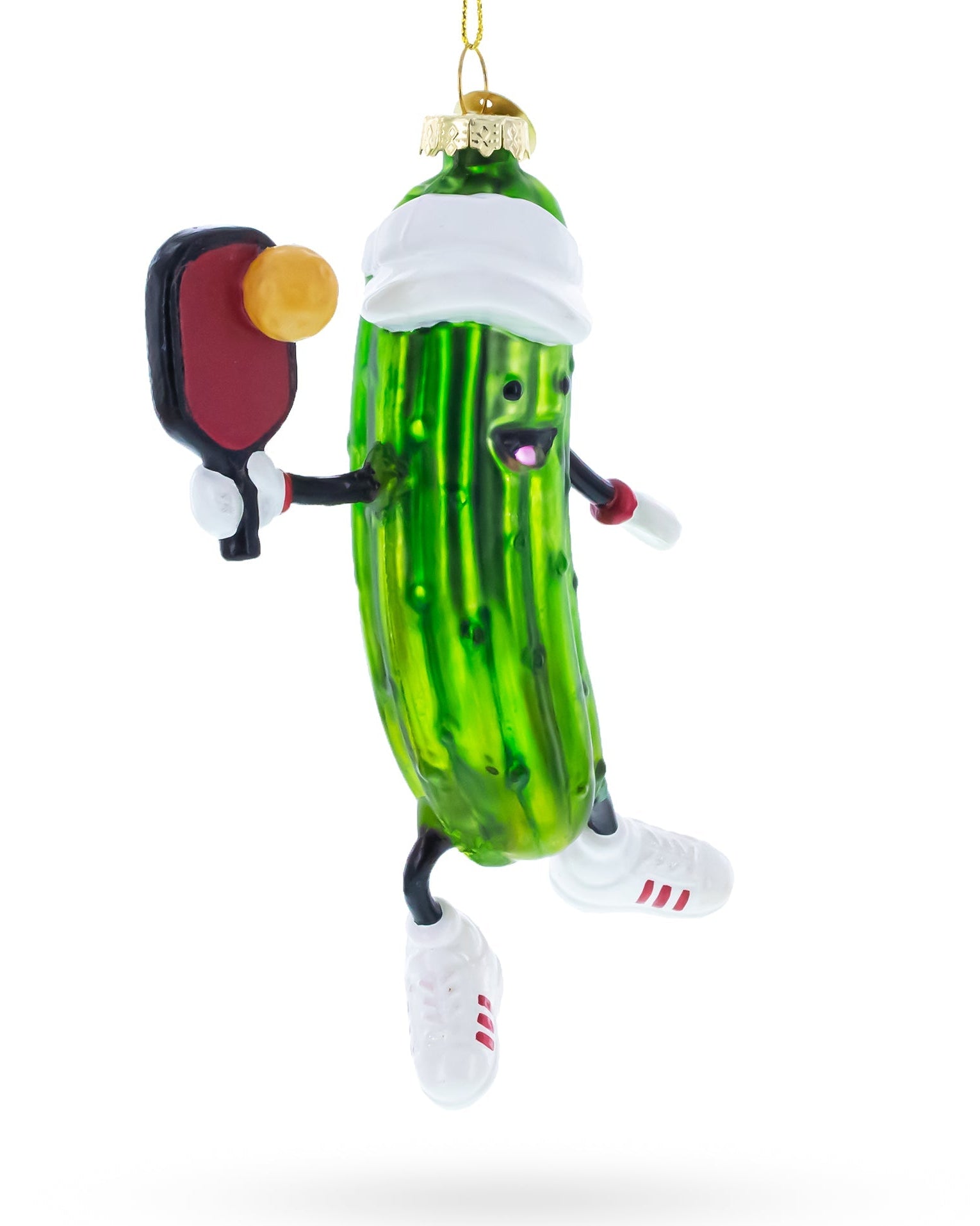 Decorative pickle ornament with arms, legs, and a face on a white background