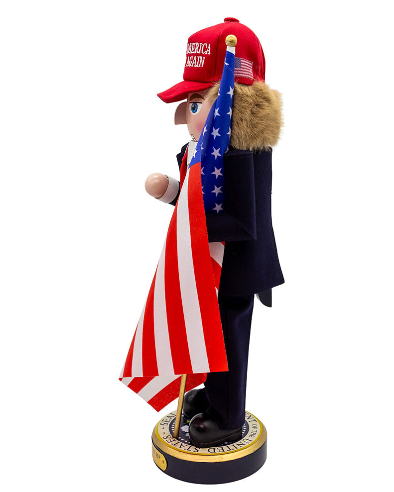 Christmas Cheer All Year Donald J. Trump Presidential Nutcracker Make America Great Again Red Baseball Cap Navy Suit American Flag on Pedestal by Kurt Adler G5013