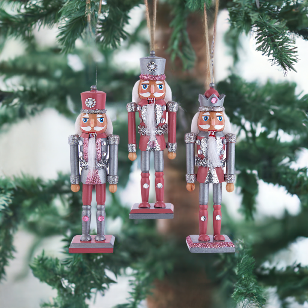 The Canton Christmas Shop 6" Pink and Pewter Nutcracker Ornaments Assorted on green tree