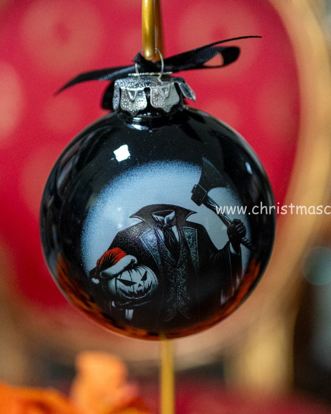 Black Christmas headless horseman ornament with with jack o lantern and Santa hat Christmas Cheer All year