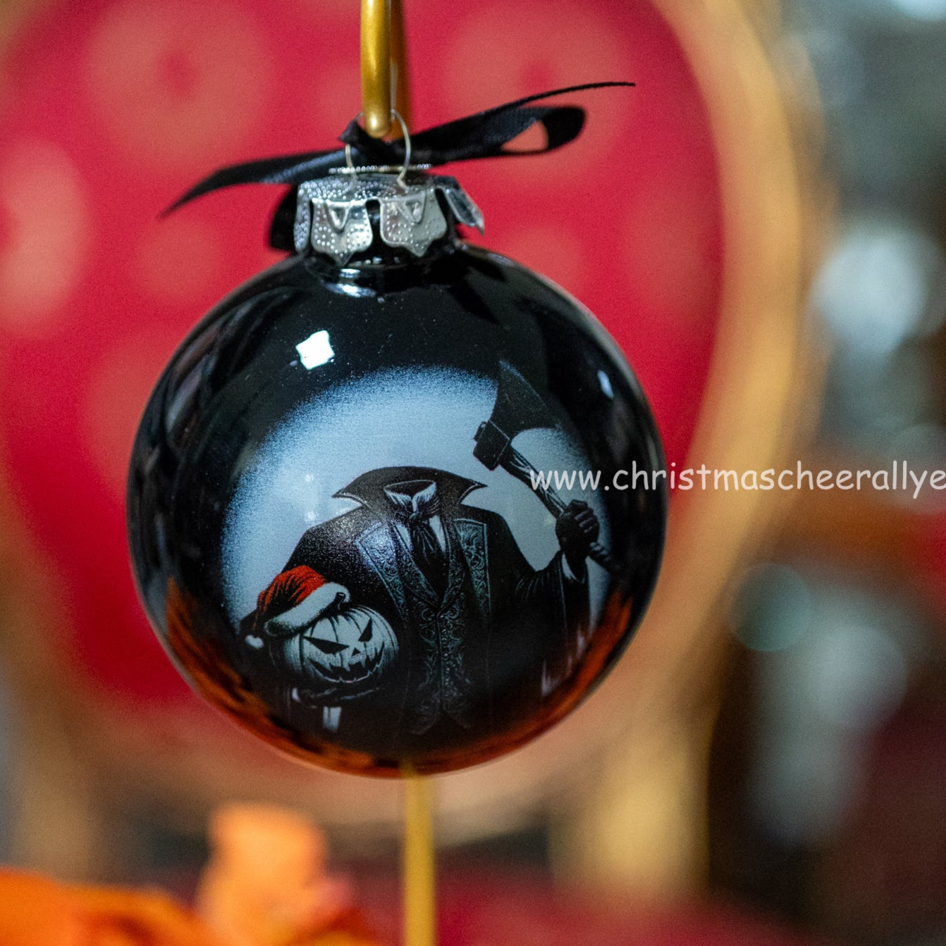 Black Christmas headless horseman ornament with with jack o lantern and Santa hat Christmas Cheer All year