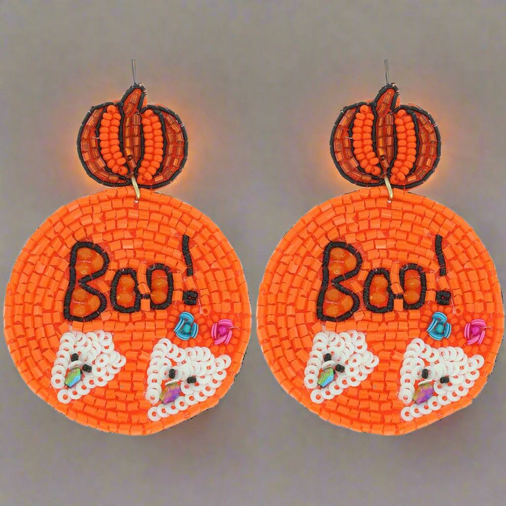Halloween-themed earrings with pumpkins and 'Boo!' text on an orange background Christmas Cheer All year