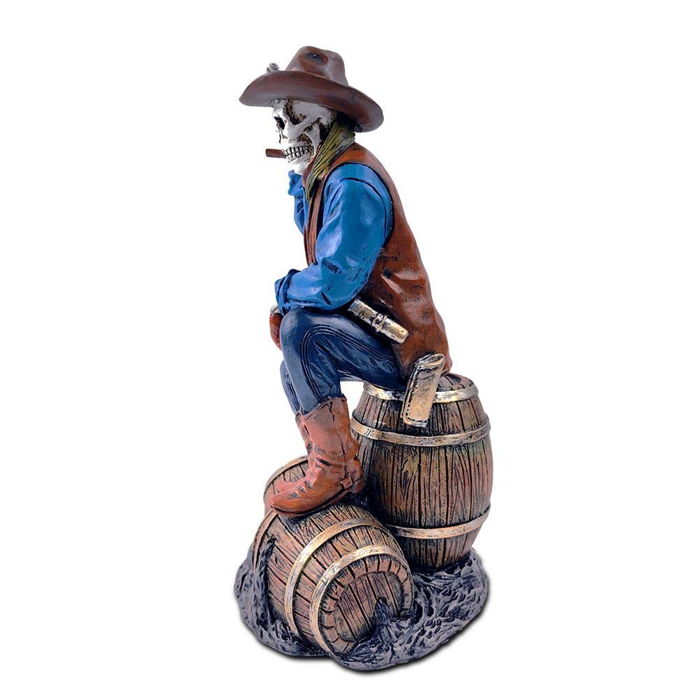 The Canton Christmas Shop skeleton gunslinger old west figurine oil man revolver cowboy cigar smoking