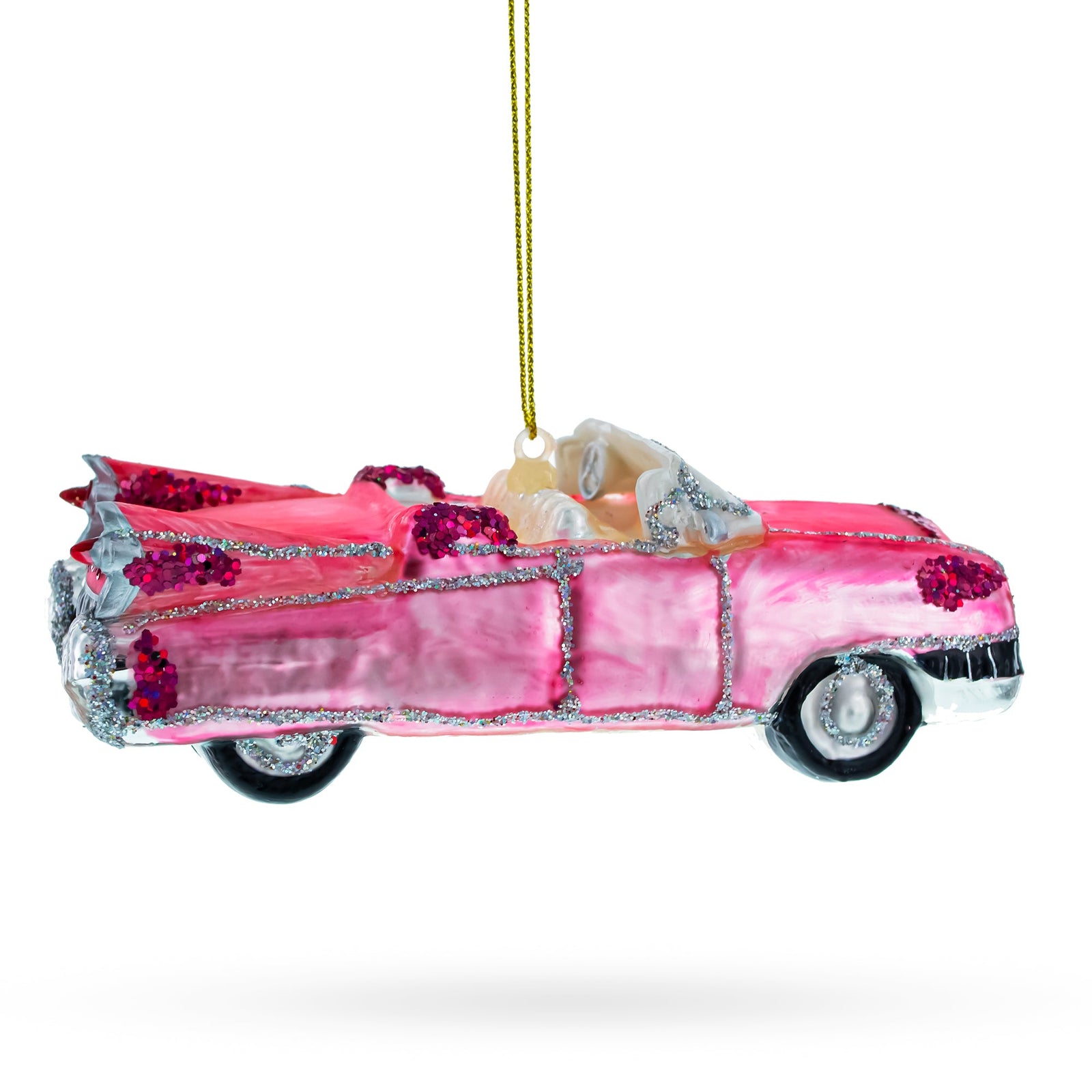 1959 Pink cadillac car ornament with decorative elements on a white background