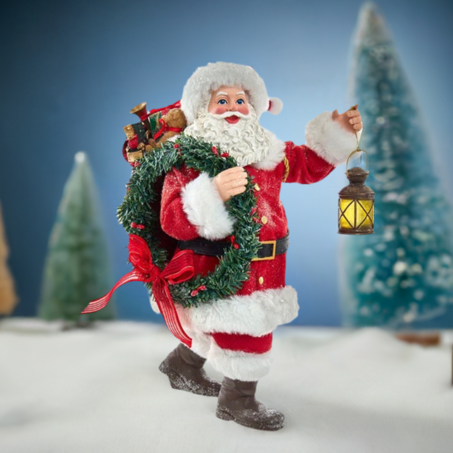 The Canton Christmas Shop 10.5&quot; Fabriche Santa with wreath and lantern figurine by Kurt Adler