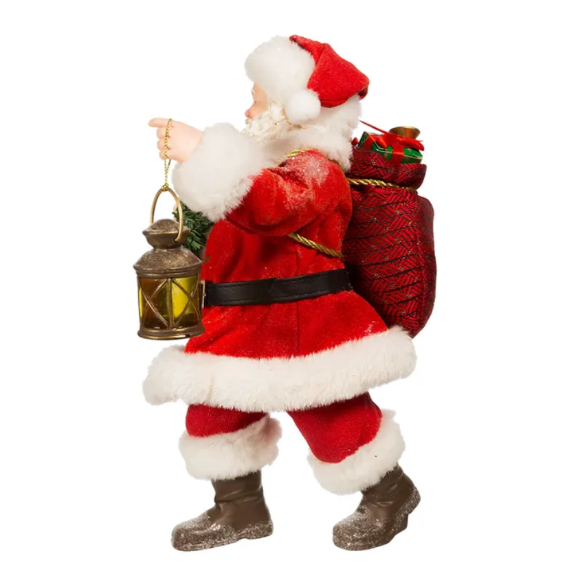 The Canton Christmas Shop 10.5" Fabriche Santa with wreath and lantern figurine by Kurt Adler