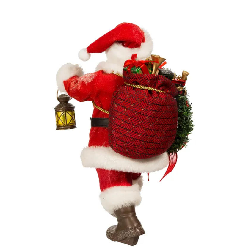 The Canton Christmas Shop 10.5" Fabriche Santa with wreath and lantern figurine by Kurt Adler