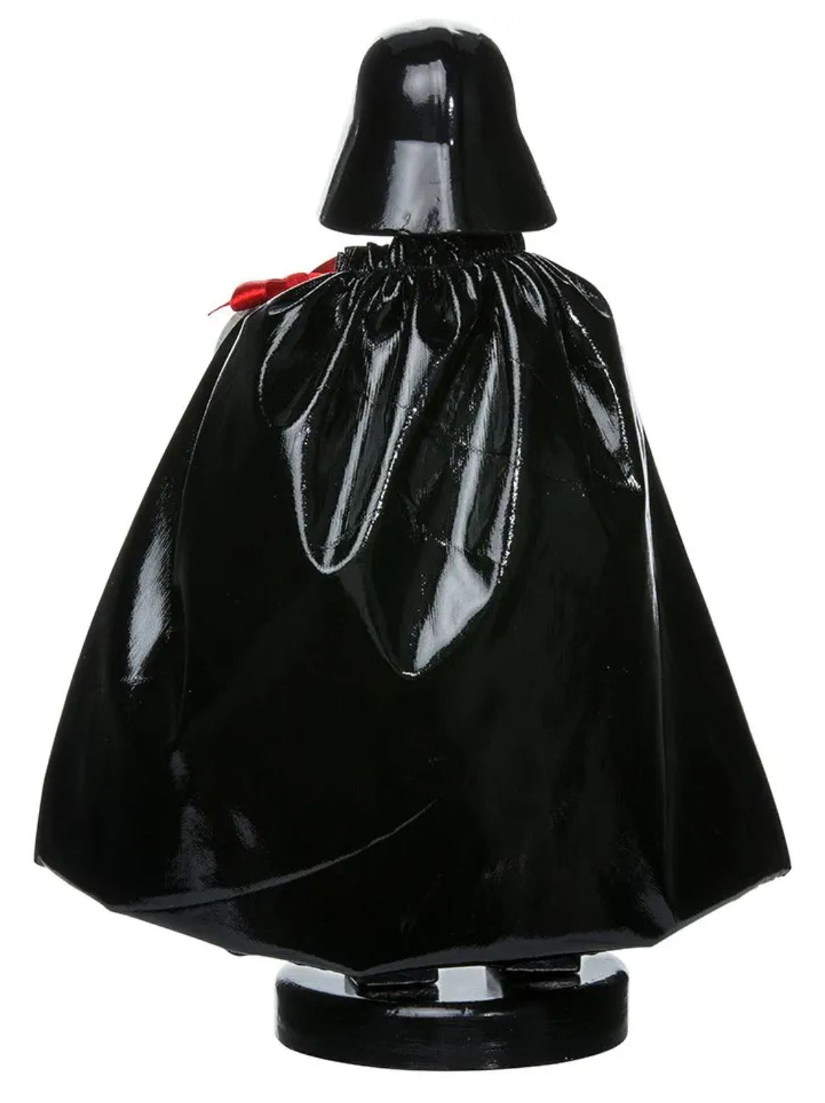 Christmas Cheer All Year A 10-inch tall Star Wars Darth Vader nutcracker figurine, featuring the character in his iconic black helmet and cape, holding a Death Star wrapped in a bow, standing on a base with a Star Wars logo from Kurt Adler