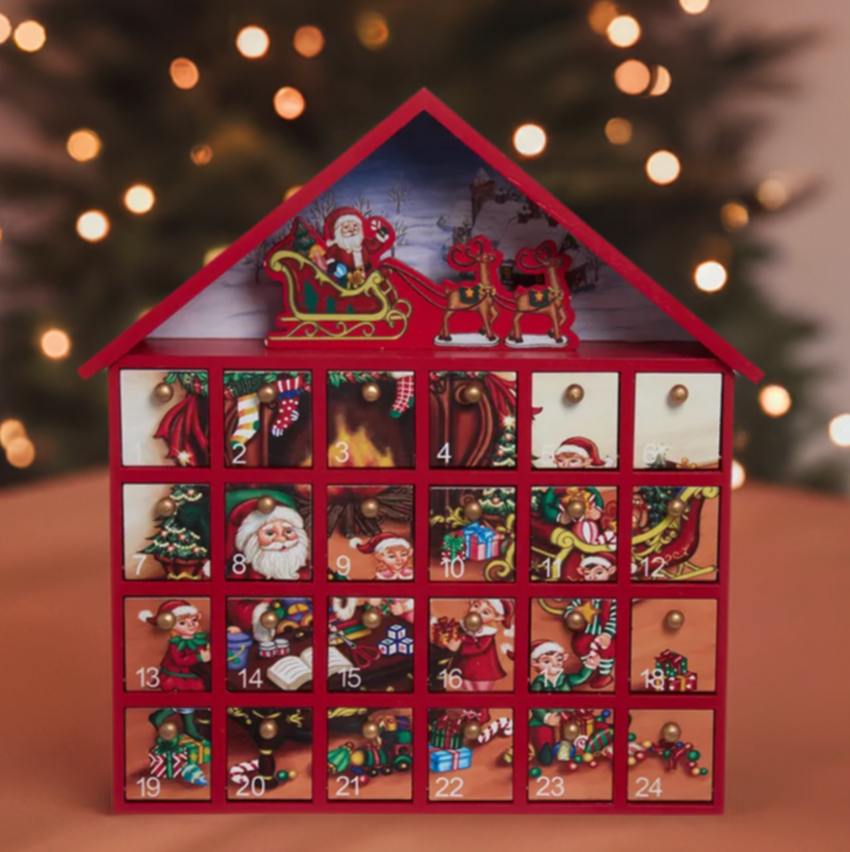 The Canton Christmas Shop 13&quot; Wooden Santa Advent Calendar with trinkets for each day by Kurt Adler on tabletop