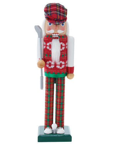 Christmas Cheer All Year 15" golf Nutcracker figurine dressed in a festive outfit with plaid hat, sweater and pants on a green base
