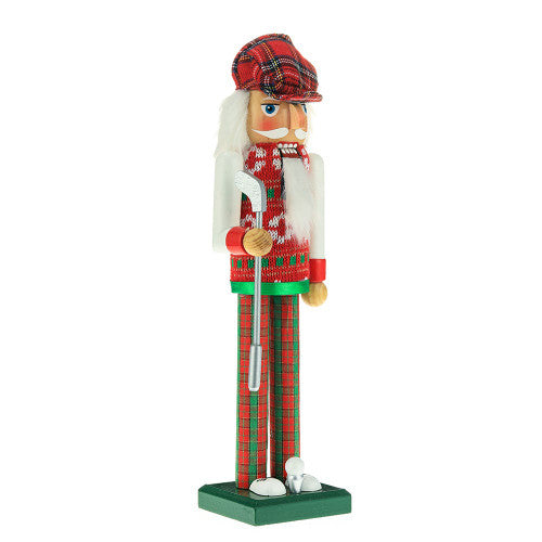 Christmas Cheer All Year 15" golf Nutcracker figurine dressed in a festive outfit with plaid hat, sweater and pants on a green base