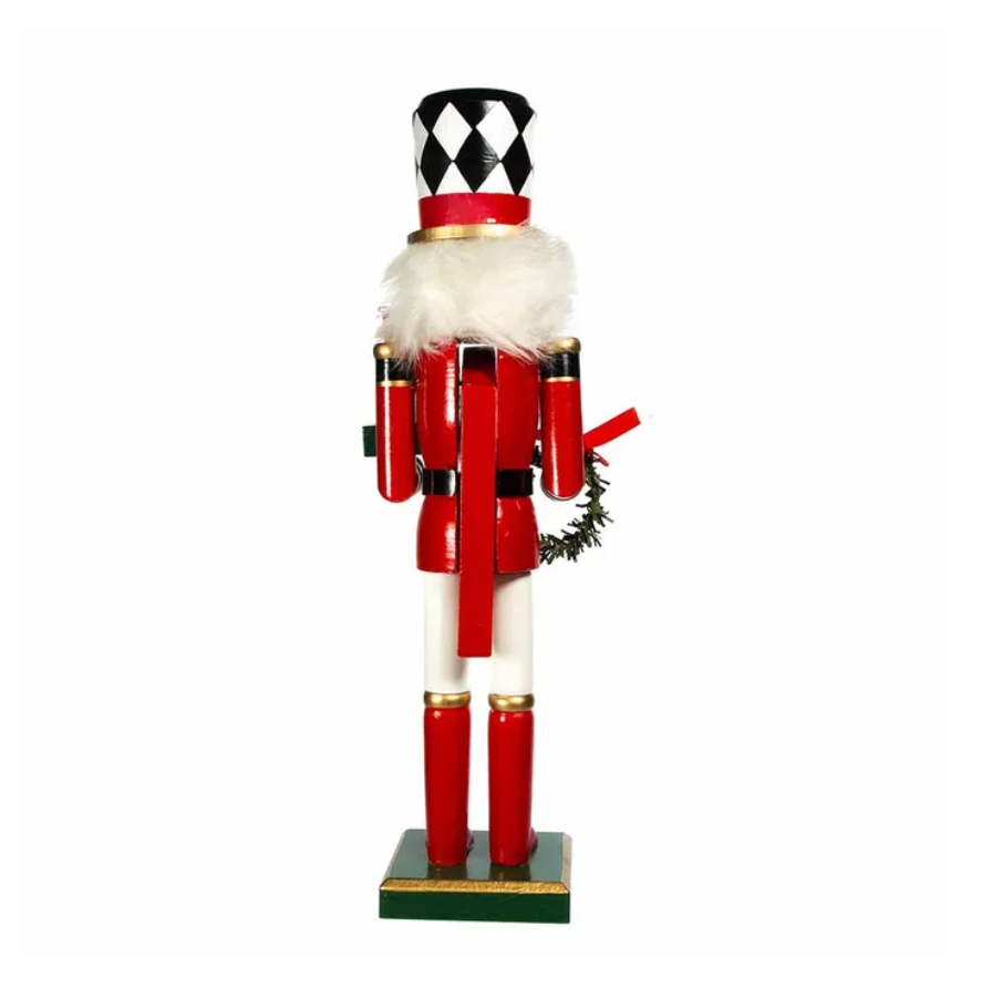 The Canton Christmas Shop 15" black and white harlequin nutcracker soldier with wreath and presents