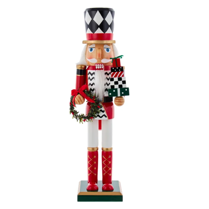The Canton Christmas Shop 15" black and white harlequin nutcracker soldier with wreath and presents
