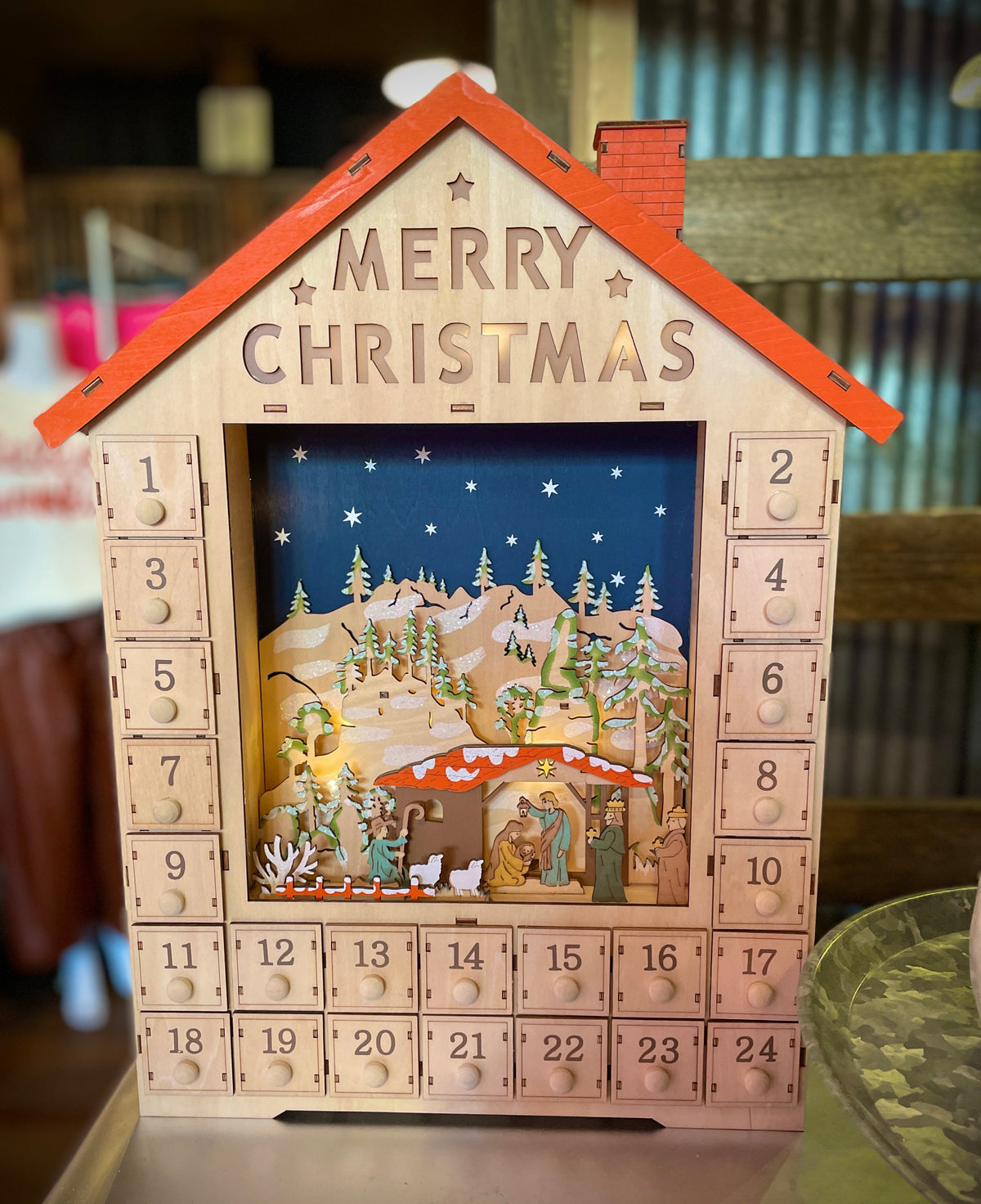 The Canton Christmas Shop 19" Lit Advent Calendar House with Nativity and Orange Roof