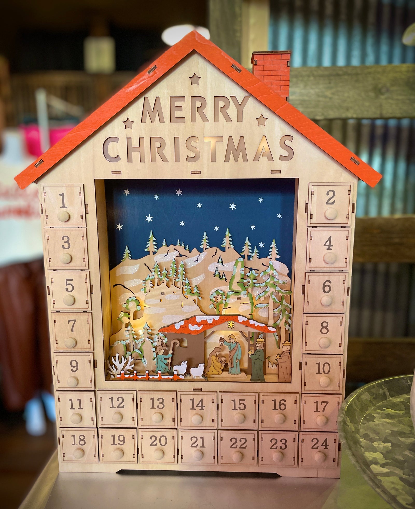 The Canton Christmas Shop 19" Lit Advent Calendar House with Nativity and Orange Roof