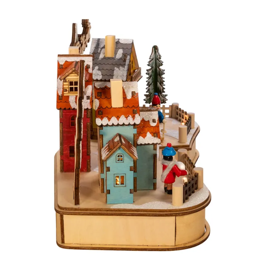 The Canton Christmas Shop 7" Battery Operated LED Christmas Village with Musical Tree by Kurt Adler