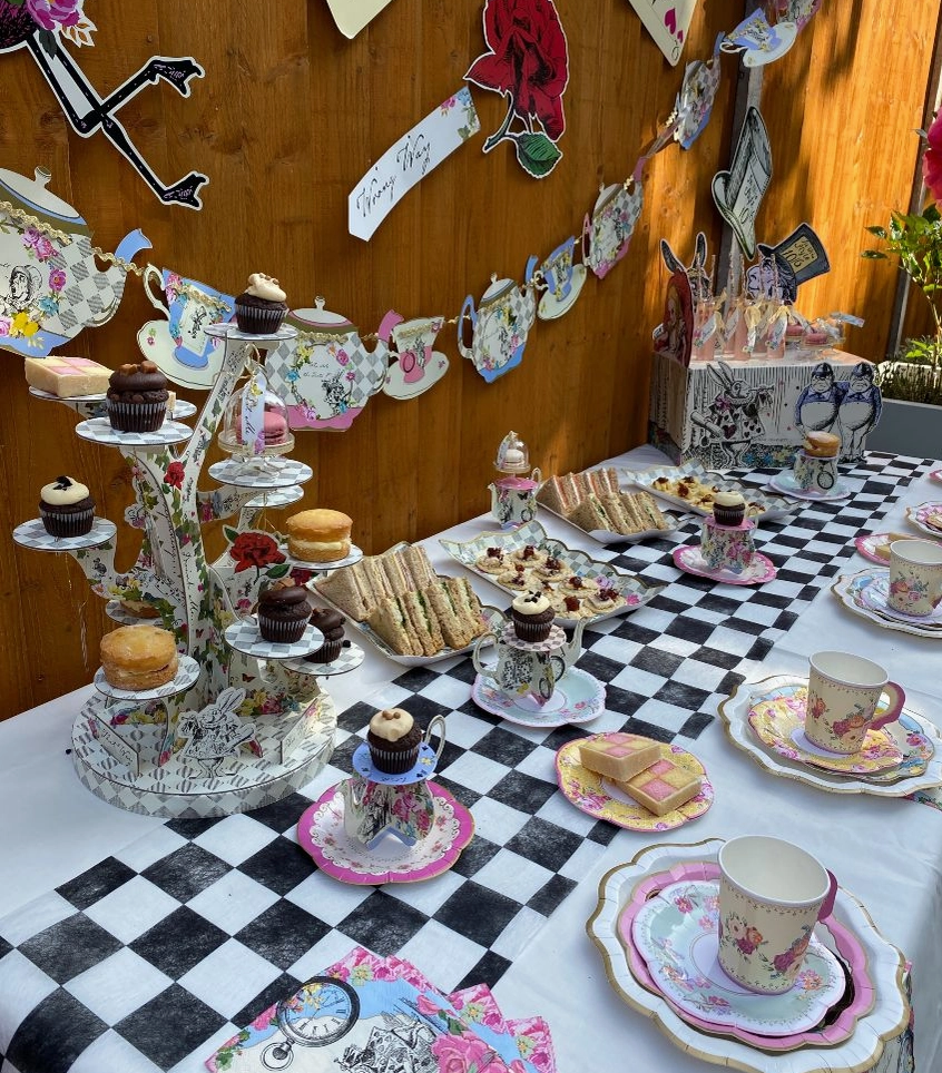The Canton Christmas Shop Alice in Wonderland Tree Shaped Cupcake Stand with characters movie signs drink me eat me wrong way white rabbit Cheshire Cat pocket watch