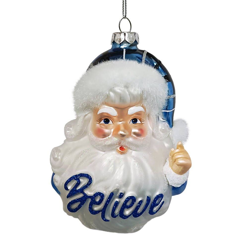 Decorative Christmas ornament of a Santa Claus face with &#39;Believe&#39; text on a white background. Christmas Cheer All Year