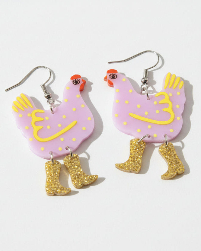 Colorful purple and yellow chicken-shaped earrings with polka dots and gold cowboy boots