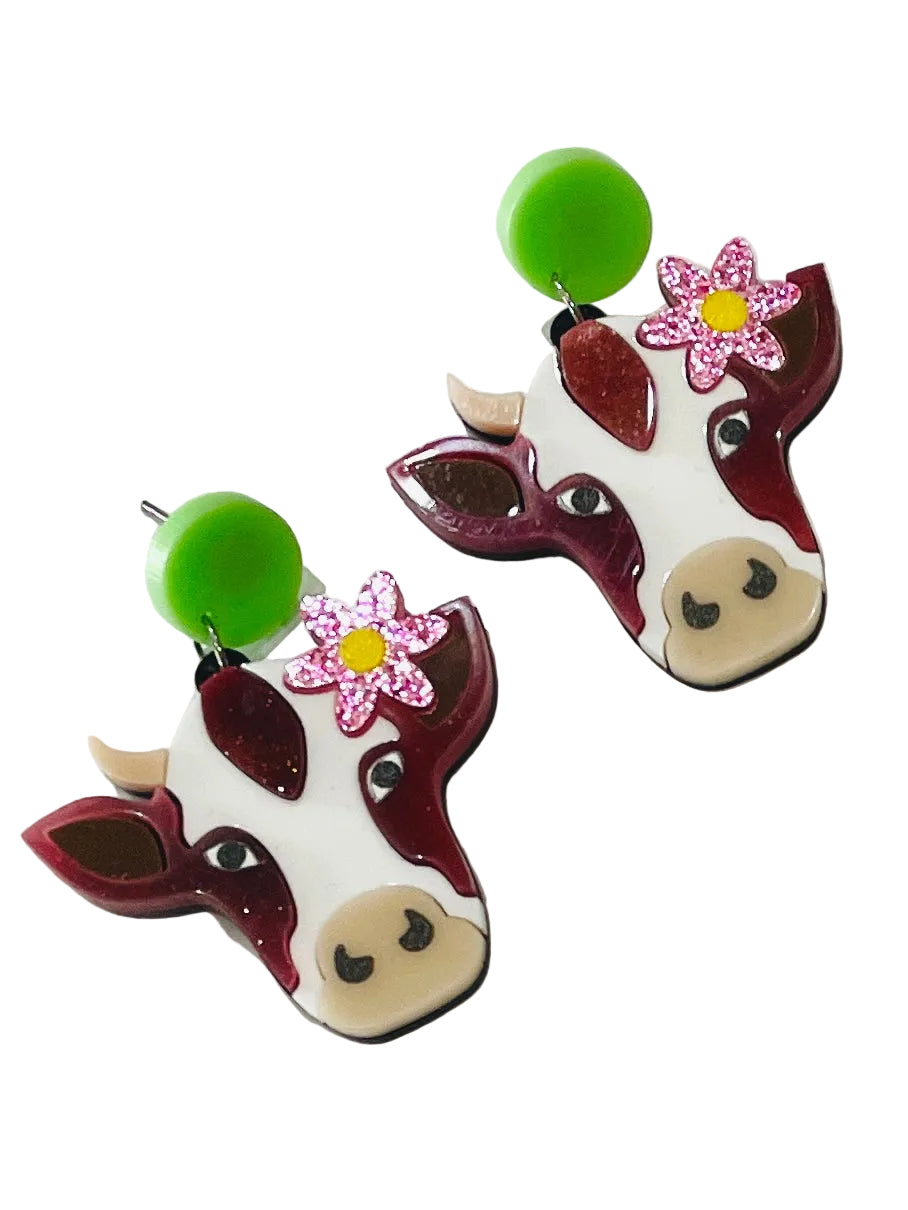 Christmas Cheer All Year cow with pink glitter flower dangle acrylic earrings with lime green stud 