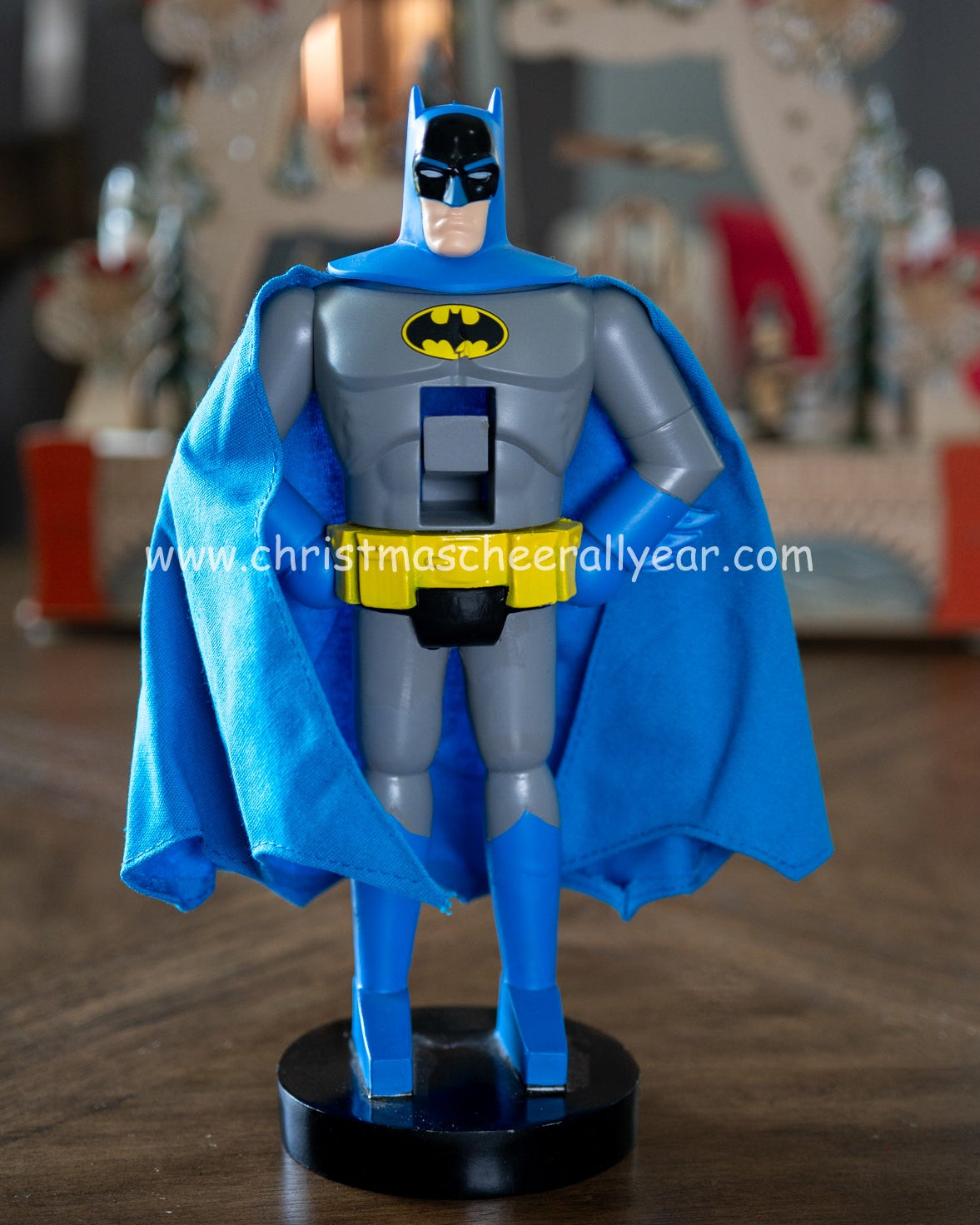 Christmas Cheer All Year DC Comics licensed Batman nutcracker by kurt adler on a wooden surface with a blurred background