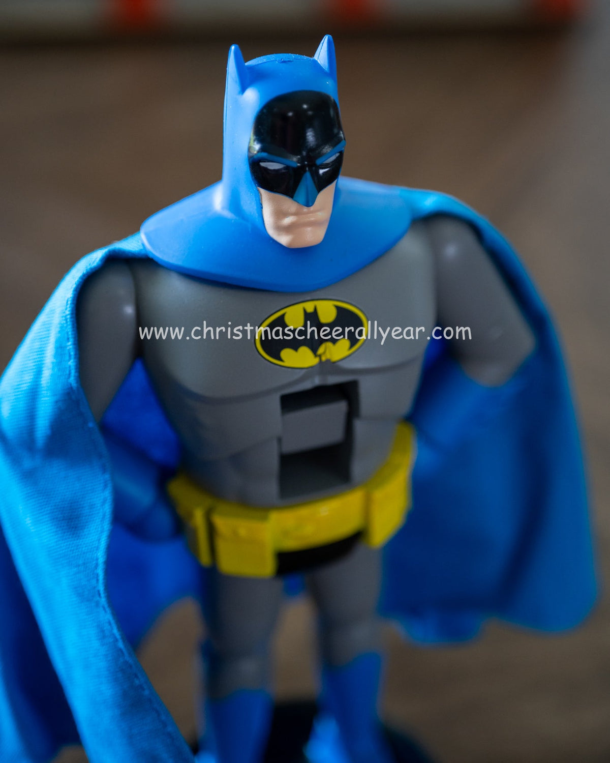 Christmas Cheer All Year DC Comics licensed Batman nutcracker by kurt adler on a wooden surface with a blurred background