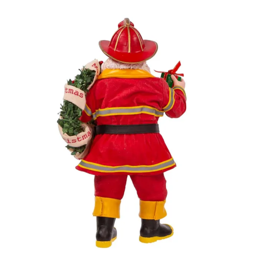 The Canton Christmas Shop Fabriche Santa Fireman with wreath and present figurine by Kurt Adler