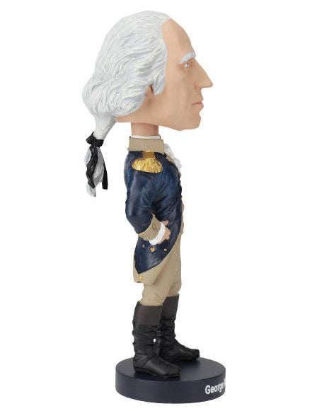 Christmas Cheer All Year collectible bobblehead figurine of George Washington in profile, featuring his signature white powdered hair, blue coat with gold epaulet, beige trousers, and black boots, standing on a black circular base labeled 'George'.