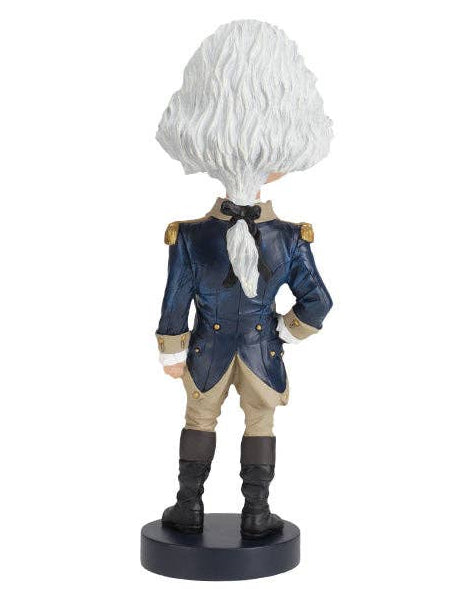 Christmas Cheer All Year George Washington stylized bobblehead figurine of a historical military officer shown from the back, featuring a large white wig, a dark blue coat with gold buttons and epaulettes, beige trousers, black boots, and a black circular base against a plain white background.