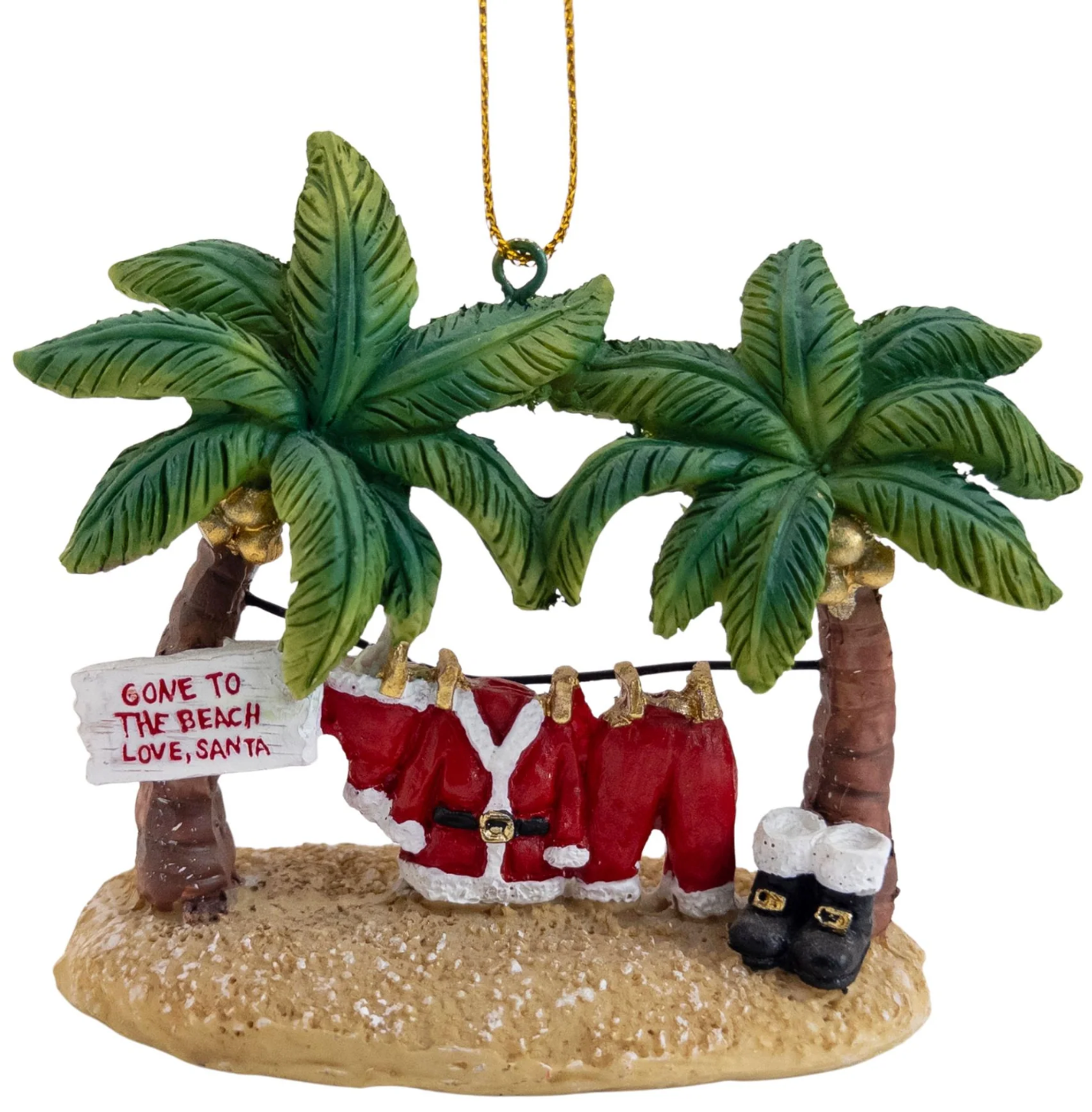 A Christmas ornament with tropical beach two green palm trees, a sandy base, a 'gone to the beach, love, Santa' sign, and Santa's suit hanging on a line.