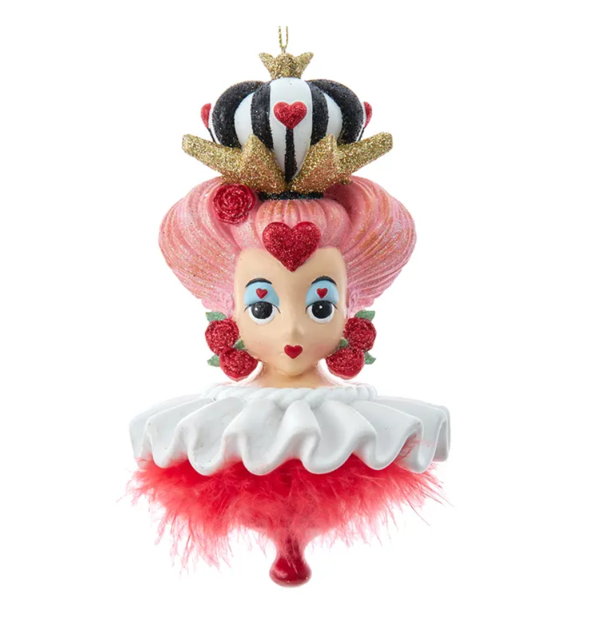 Decorative Queen of Hearts Holly Hat ornament resembling a character with pink hair, red heart, and crown on a white background Christmas Cheer All Year