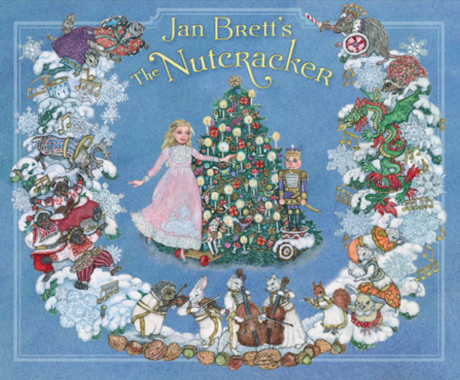 Illustrated book cover of 'The Nutcracker' by Jan Brett with characters and a Christmas tree on a blue background a retelling of the Nutcracker Suite Ballet story Christmas Cheer All Year