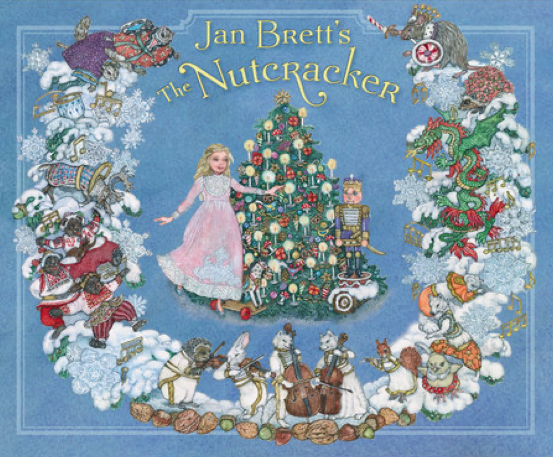 Illustrated book cover of 'The Nutcracker' by Jan Brett with characters and a Christmas tree on a blue background a retelling of the Nutcracker Suite Ballet story Christmas Cheer All Year
