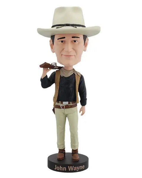 Christmas Cheer All Year John Wayne Bobblehead in a cowboy outfit holding a gun with holster on a white background
