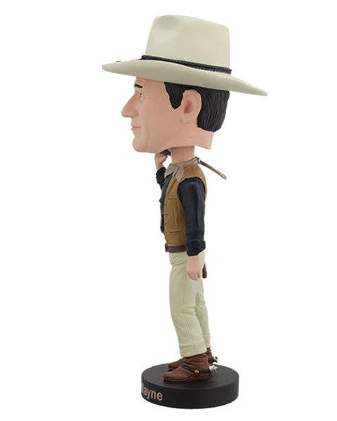 Christmas Cheer All Year John Wayne Bobblehead in a cowboy outfit holding a gun with holster on a white background