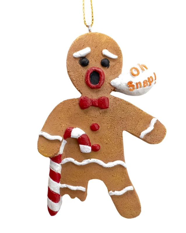 Christmas Cheer All Year gingerbread man Christmas ornament with a surprised face, red bow tie, white icing details, a candy cane, and a small speech bubble that says 'Oh Snap!' with a broken cookie leg