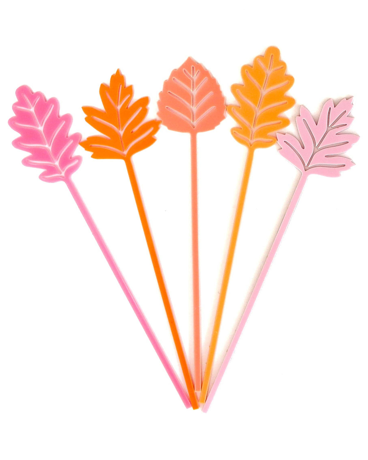 Five colorful acrylic leaf drink stirrers for holiday drinks