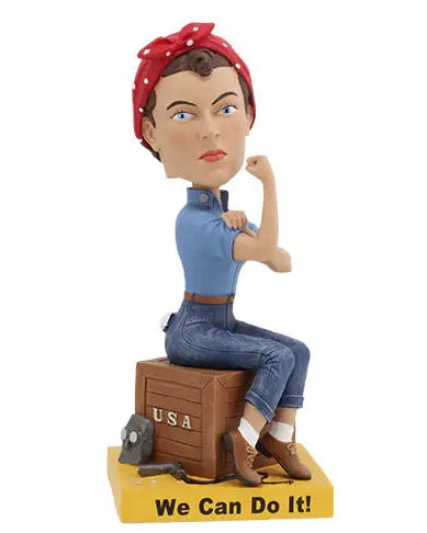 Christmas Cheer All Year Rosie the Riveter Bobblehead figure of a woman with a red bandana and blue shirt, sitting on a box with 'USA' and 'We Can Do It!' text.