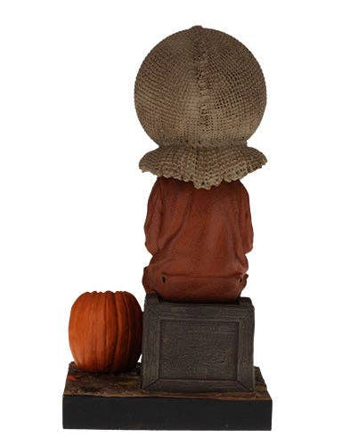 Christmas Cheer All Year Halloween Movie Sam Trick'r'treat film Bobblehead figure of a character with a burlap sack on his head and pumpkin at his feet 