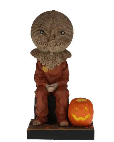 Christmas Cheer All Year Halloween Movie Sam Trick'r'treat film Bobblehead figure of a character with a burlap sack on his head and pumpkin at his feet 