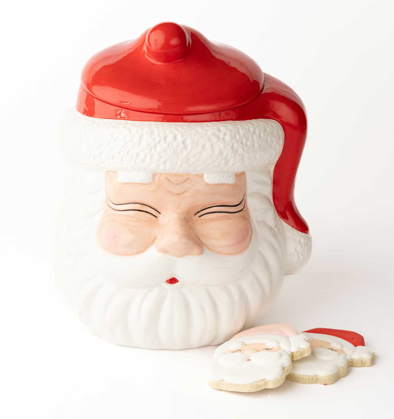 Christmas Cheer All Year Cookie jar shaped like a Santa Claus face with a red hat on a white background