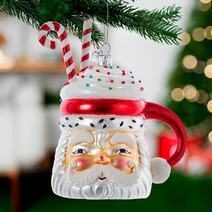 Decorative Christmas ornament shaped like a Santa Claus mug with candy canes on a tree by Kurt Adler Christmas Cheer All Year
