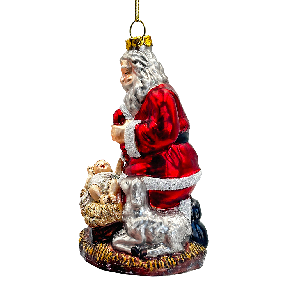 The Canton Christmas Shop Santa Kneeling by Jesus in Manger Glass Ornament Nativity Savior of the World Lamb of God