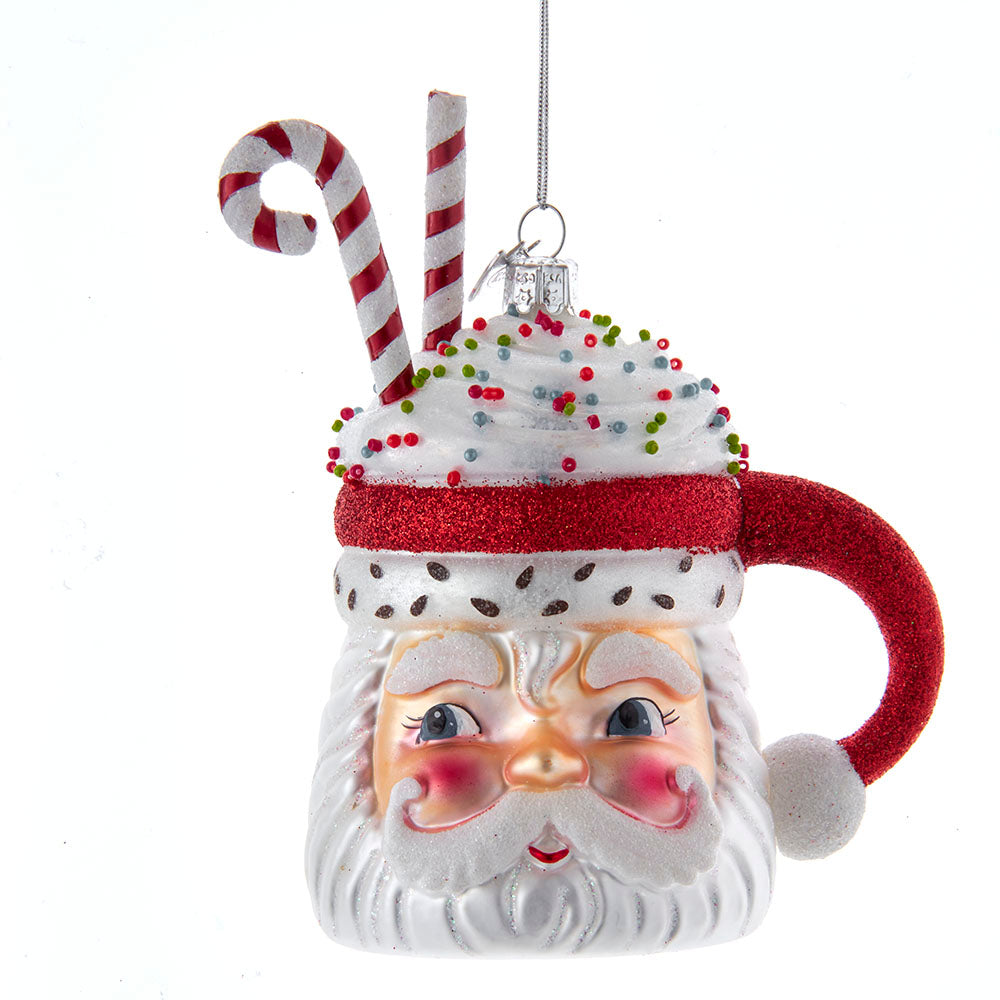 Christmas Cheer All Year Decorative Christmas ornament shaped like a glass mug with a Santa face, candy cane, and red hat 
